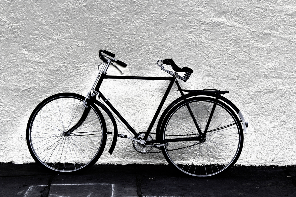 Black Bicycle near White Wall